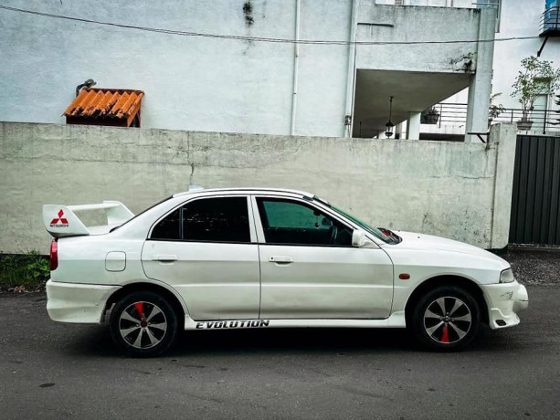 mitsubishi-lancer-ck2-1998-big-1