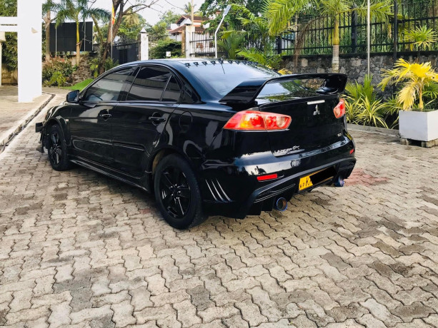 mitsubishi-lancer-ex-glx-2008-big-3