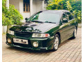 mitsubishi-lancer-ck1-small-0