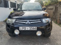 mitsubishi-l200-2011-small-0