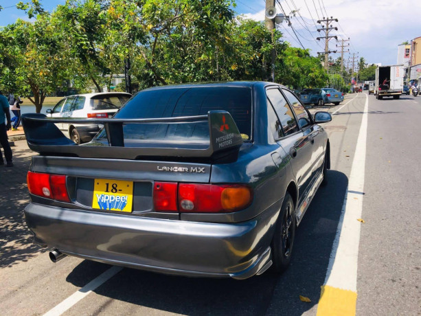 mitsubishi-lancer-cb1-1994-big-2