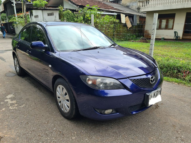 mazda-axela-2003-big-0