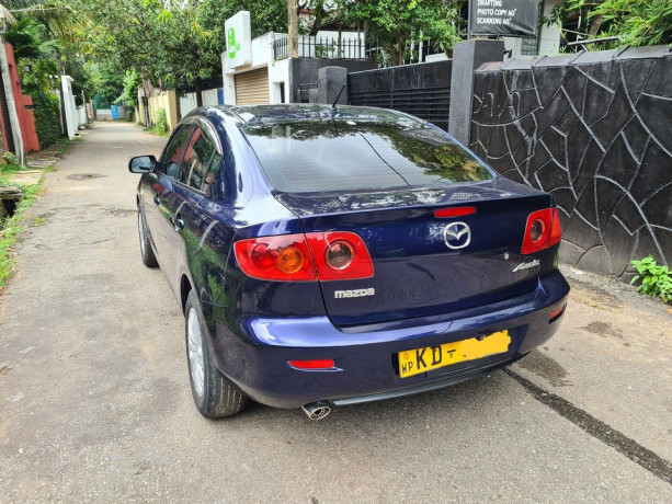mazda-axela-2003-big-2