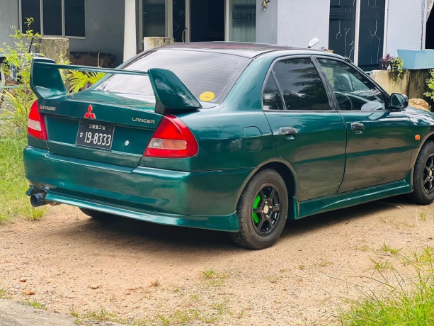 mitsubishi-lancer-ck1-big-1