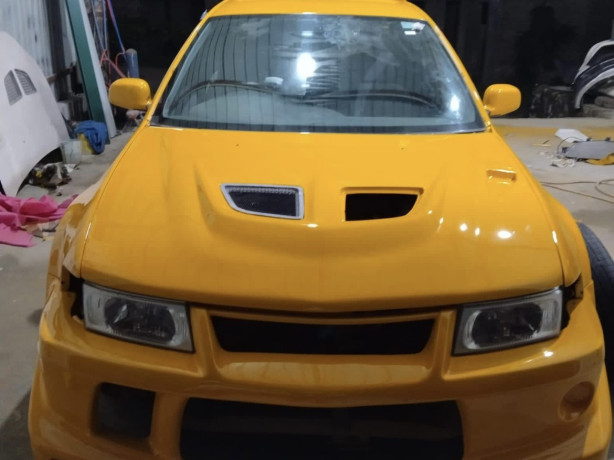 mitsubishi-lancer-ck1-1999-big-0