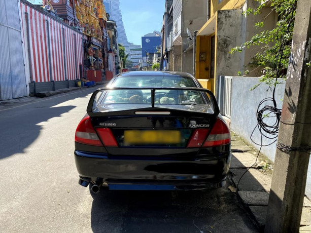 mitsubishi-lancer-ck2-2002-big-2