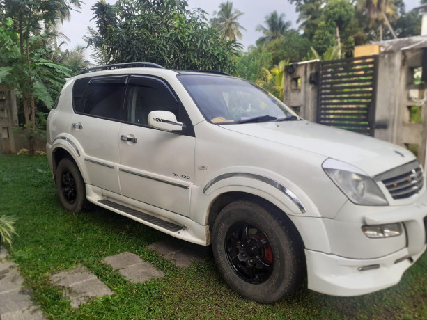 micro-rexton-rx320-2005-big-0