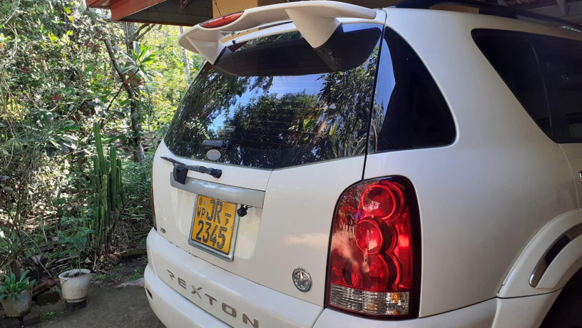 micro-rexton-rx320-2005-big-4