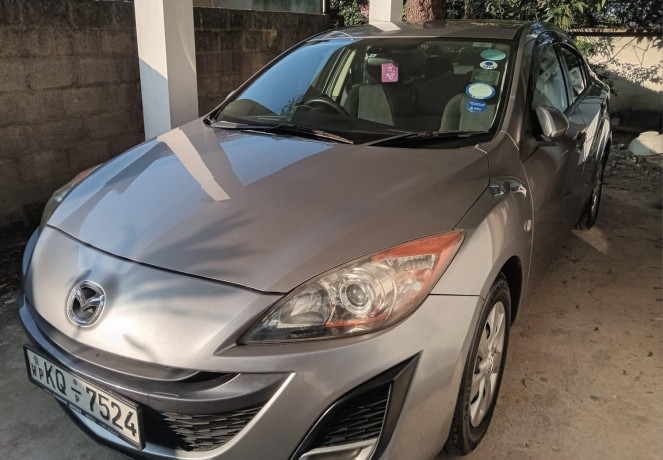mazda-axela-2009-big-4
