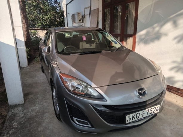 mazda-axela-2009-big-0