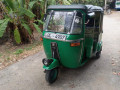 bajaj-4-stroke-three-wheel-small-0