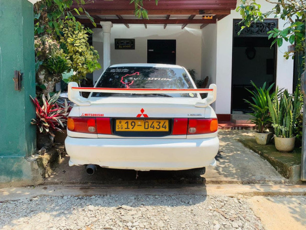 mitsubishi-lancer-cb3a-efi-1995-big-1
