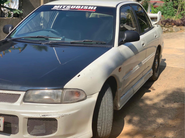 mitsubishi-lancer-cb3a-efi-1995-big-3