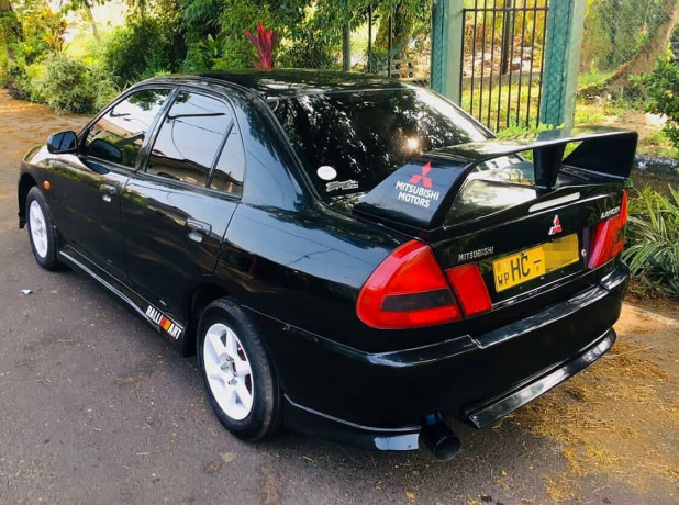 mitsubishi-lancer-ck2-2002-big-4