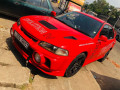 mitsubishi-lancer-ck1-small-0