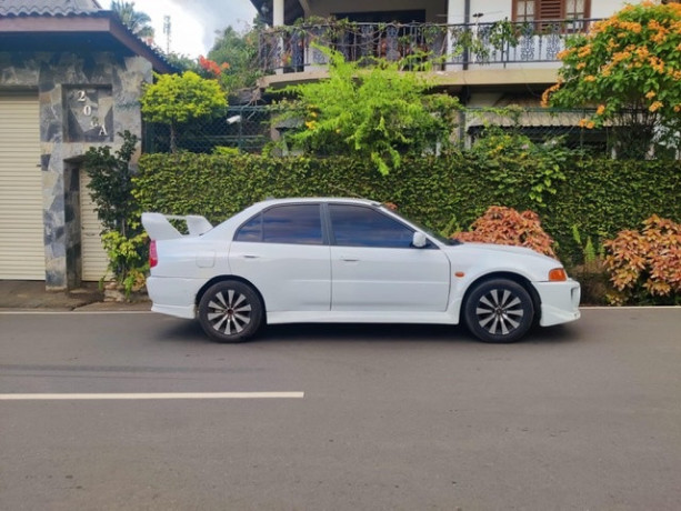 mitsubishi-lancer-ck1-1998-big-0