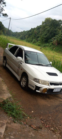 mitsubishi-lancer-ck1-big-1