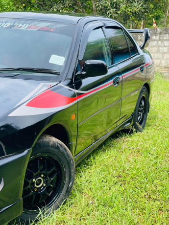 mitsubishi-lancer-ck1-big-3