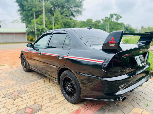 mitsubishi-lancer-ck1-big-1