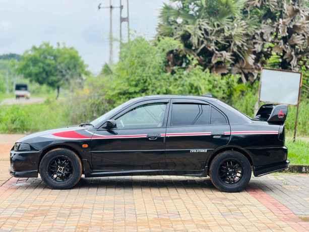 mitsubishi-lancer-ck1-big-0