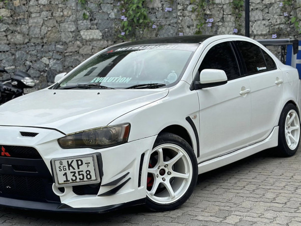 mitsubishi-lancer-ex-2011-big-0