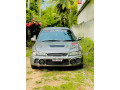 mitsubishi-lancer-ck1-small-1