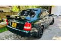 mazda-familia-323-2000-small-2