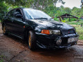 mitsubishi-lancer-ck1-small-0
