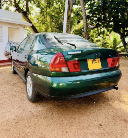 mitsubishi-lancer-carishma-big-4