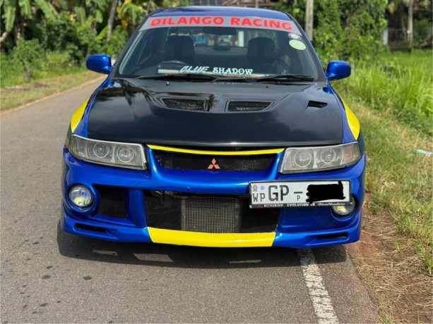 mitsubishi-lancer-ck1-efi-big-1