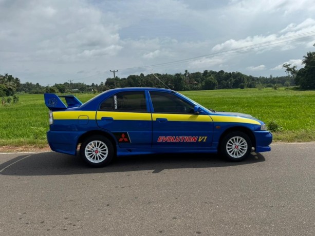 mitsubishi-lancer-ck1-efi-big-4